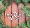 Vánoční ozdoba s motivem psí tlapky s křídly