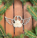 Vánoční ozdoba s motivem psí tlapky s křídly a jménem